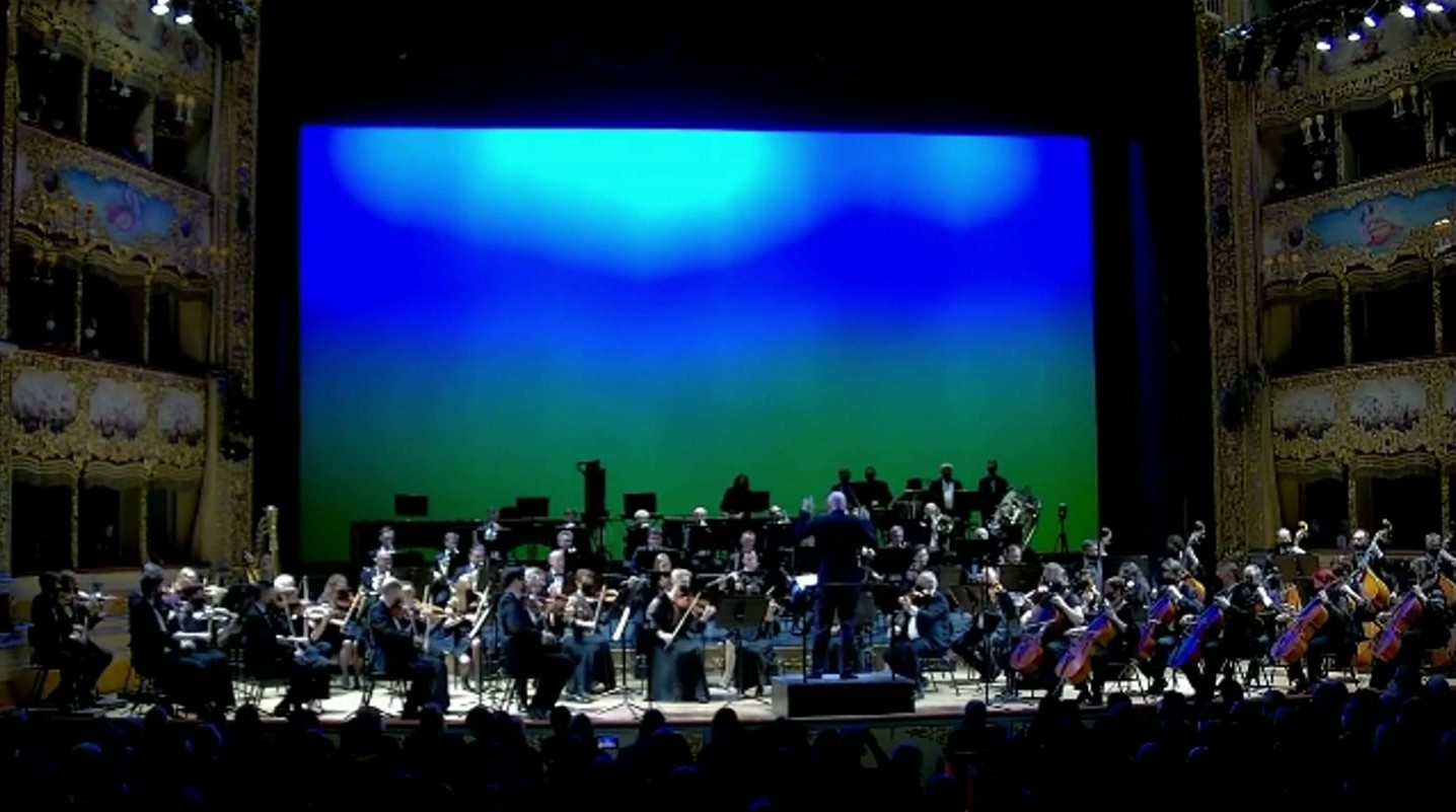 Orchestra performing in a historic theatre